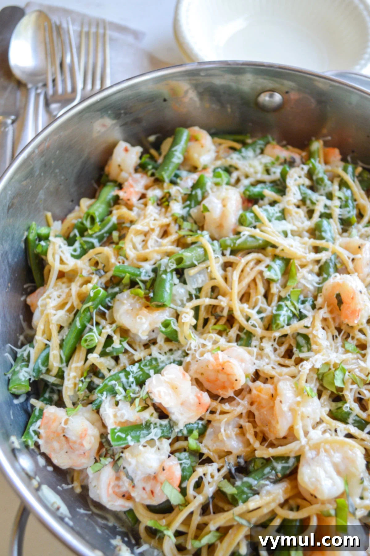 Easy 30 Minute Creamy Shrimp Pasta with Green Beans 7 shrimp pasta with green beans in steel pot