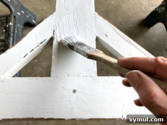 Revive Your Vintage Screen Door 8 Molding pieces drying after painting.