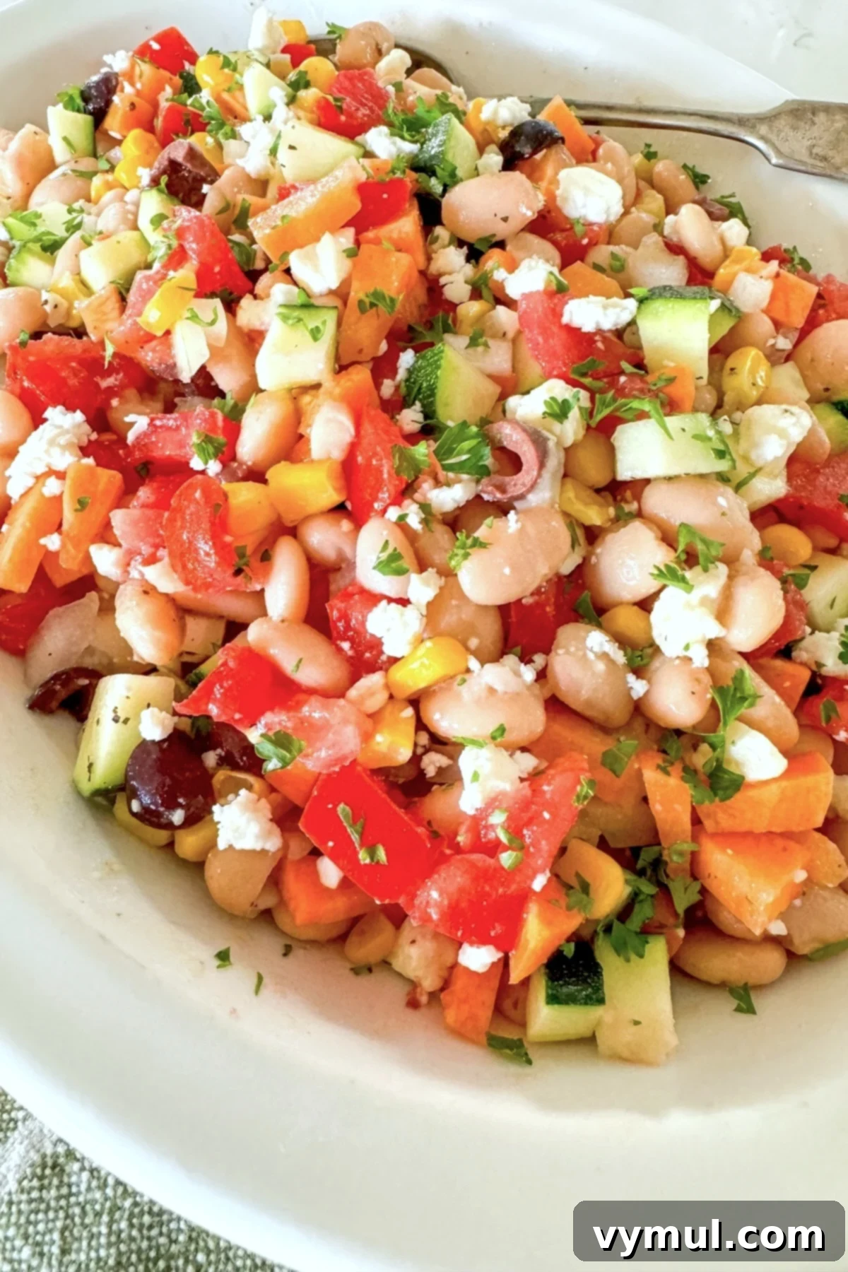 Fast Flexible Chopped Salad 2 Vibrant chopped salad in a white bowl, ready to be served