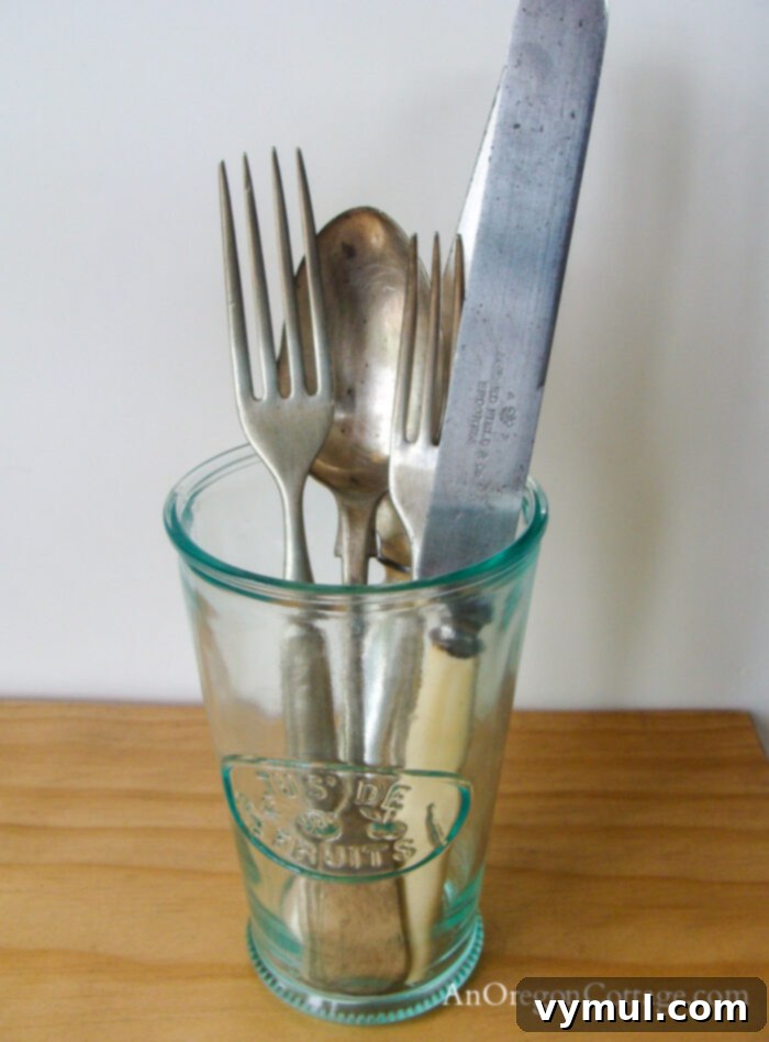 Thrift-flatware Vintage flatware in a glass