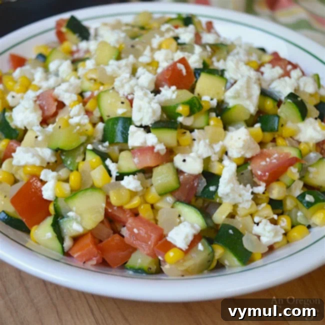 Mastering Zucchini From Garden to Table 46 Recipes Included 7 Zucchini Corn and Tomato Saute with Feta - a vibrant and fresh dish perfect for summer, featuring garden-fresh zucchini.