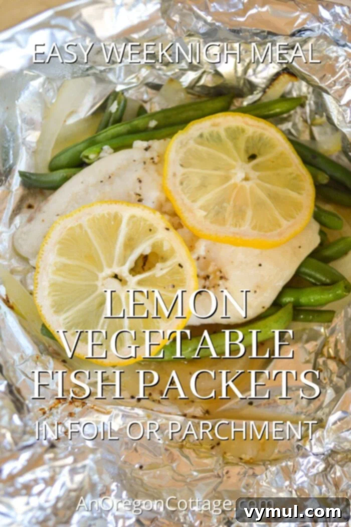 Zesty Lemon Fish and Veggie Grill or Bake Packets 2 lemon vegetable fish packets cooked and opened, showing tender fish and bright vegetables with lemon slices