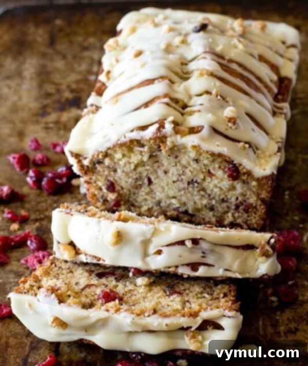The Complete Collection of 17 Cranberry Bread Recipes Yeast Gluten-Free and Paleo 15 Cranberry Bread Recipes-Cranberry-Pecan-Bread-with-White-Chocolate-Glaze, a truly indulgent treat.