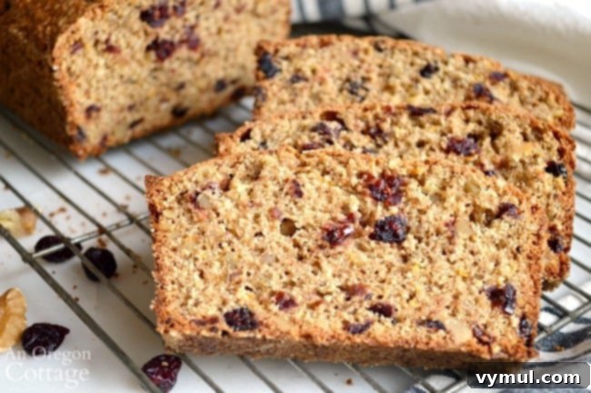 The Complete Collection of 17 Cranberry Bread Recipes Yeast Gluten-Free and Paleo 3 Cranberry Bread Recipes-Cranberry Bread Recipe slices, showcasing a healthy whole wheat option.