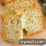 savory zucchini bread sliced and broken in half