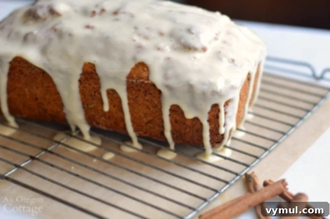 Warm Maple Spiced Whole Wheat Carrot Bread 8 Spiced Carrot Bread Recipe-glaze on rack