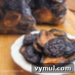 dried plums in bags and bowl