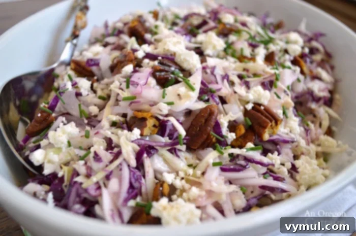 Sixty Plus Fast Healthy Recipes for Simple Meal Prep 10 A vibrant Cabbage Salad with a creamy Feta Vinaigrette and spiced pecans, offering a fresh and crunchy texture.