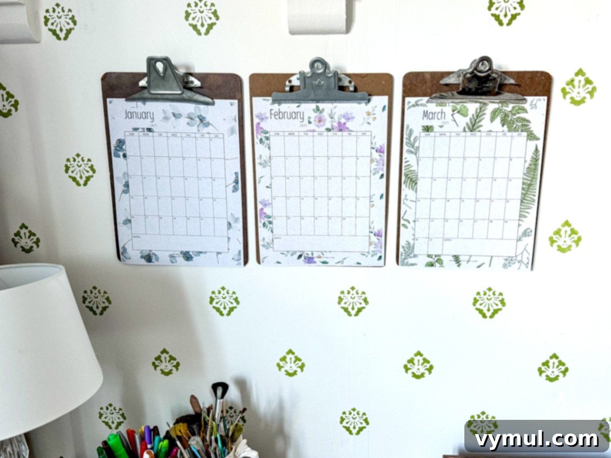 calendar printables on clipboards on wall for quarterly view