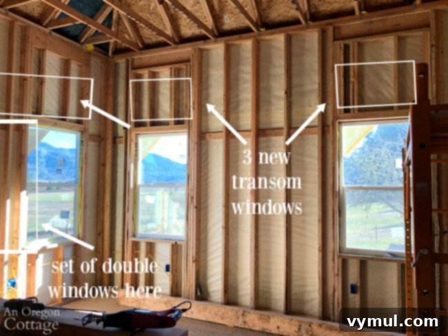 Farmhouse bedroom windows before renovation, showing the original setup.