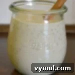Velvety Garlic Pepper Dressing 5 Creamy Garlic Pepper Salad Dressing in a small glass jar