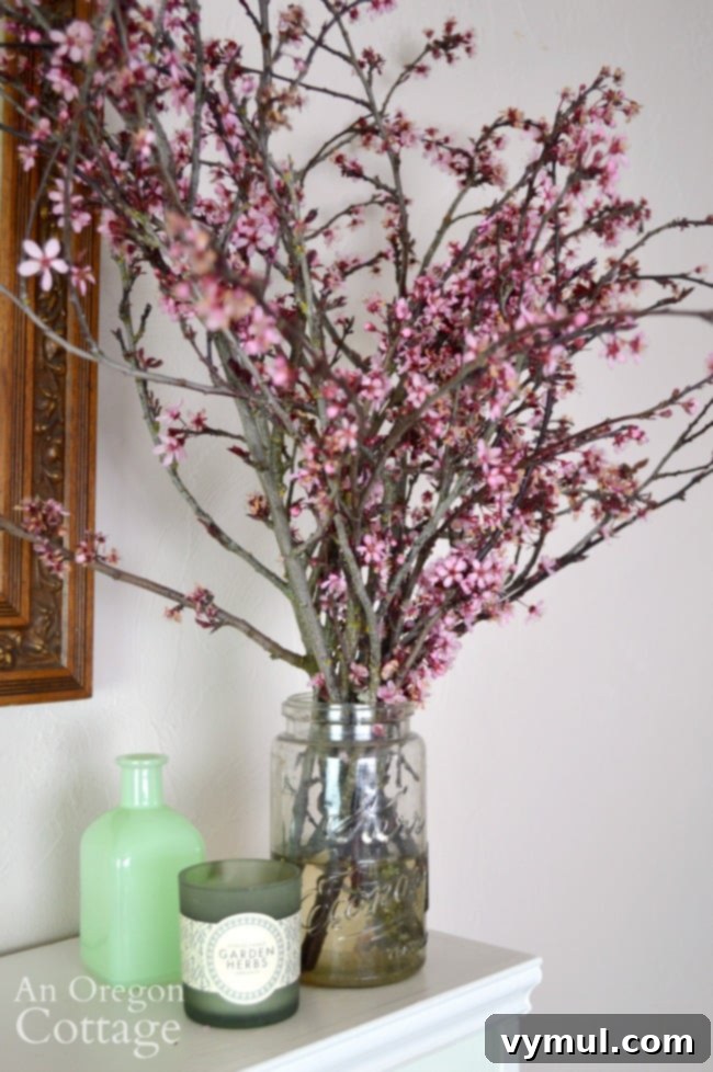 Effortless Spring Home Revamp 3 Flowering cherry branches on mantel