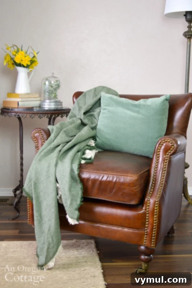 Effortless Spring Home Revamp 6 leather chair with throw and daffodils