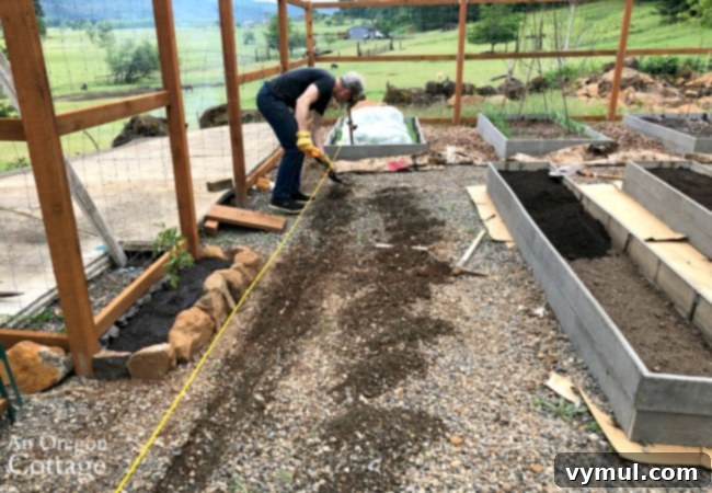 Budget Garden Watering Made Easy 5 Digging trench for DIY garden irrigation system