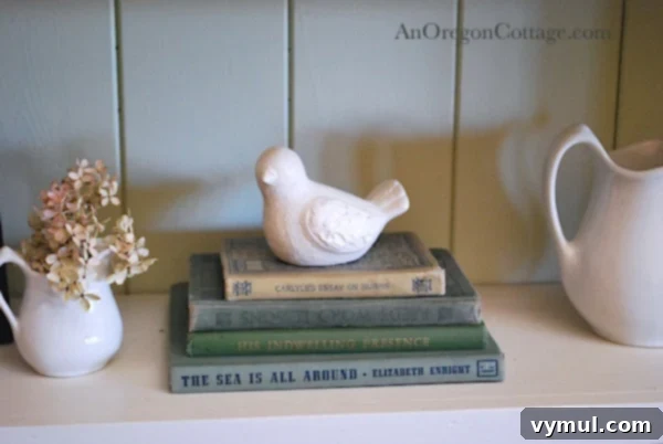 Green covered books with dove Green covered books with dove