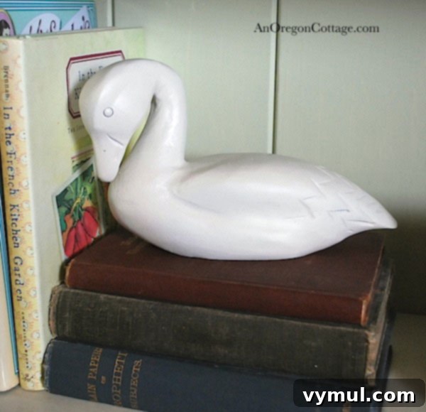 Close-up of elegant white painted duck figurine