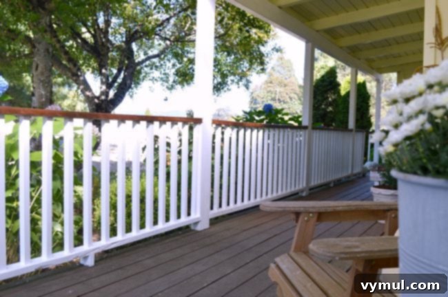 Beautifully refreshed and newly painted porch railings, enhancing the curb appeal of a home.