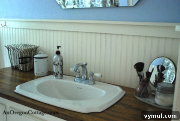 Bathroom counter with makeup items neatly arranged on a tray, creating a tidy display