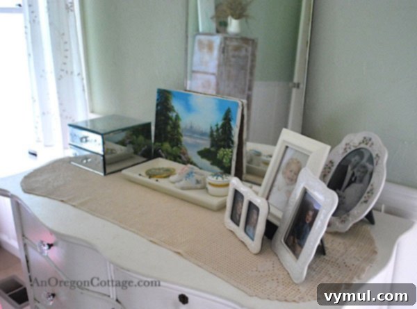 Jewelry and small keepsakes neatly arranged on a tray on a dresser