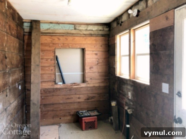 Crossing Borders in a World Gone Wild 5 laundry room bare wood walls