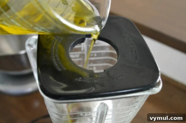 Classic Caesar Salad Dressing-adding oil