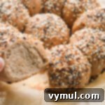 holding artisan sourdough roll