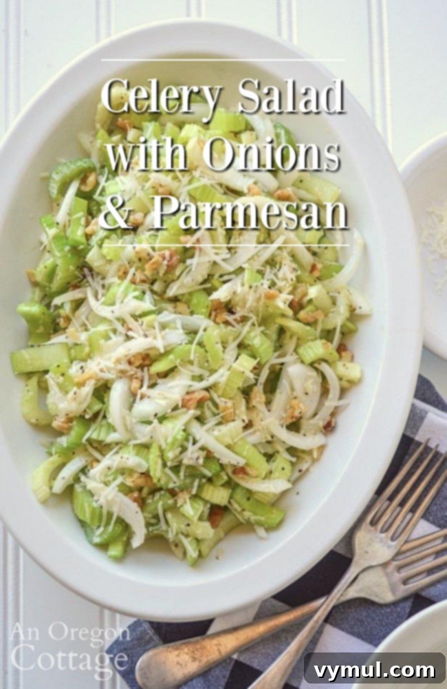 Delicious celery salad with onions and parmesan, garnished with walnuts