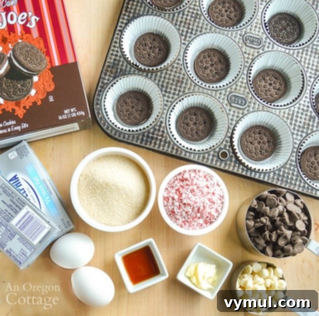 ingredients for peppermint mini Oreo cheesecakes including cream cheese, eggs, sugar, vanilla, peppermint extract, and crushed candy canes