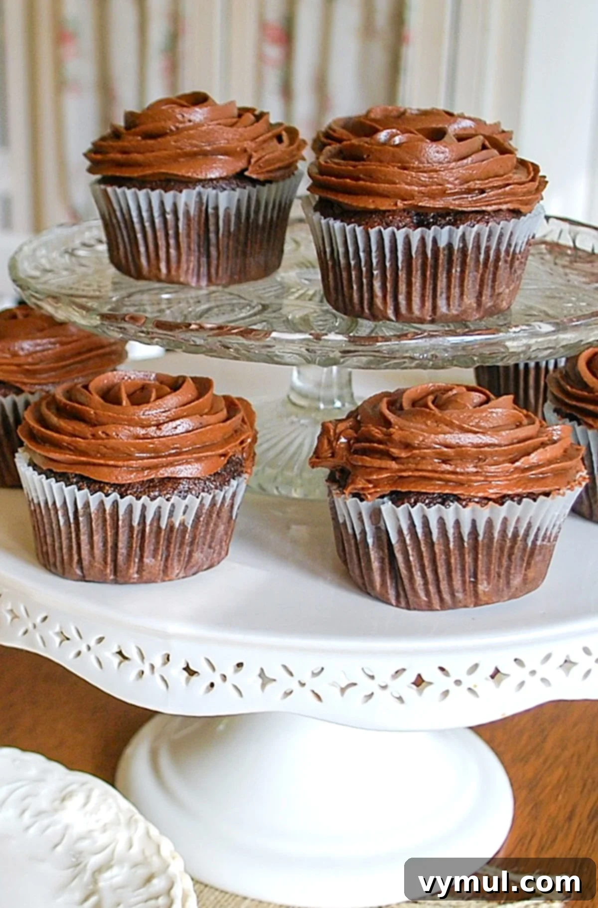 Secretly Healthy Chocolate Zucchini Cupcakes 2 Delicious zucchini chocolate cupcakes on a tiered stand, ready to be enjoyed