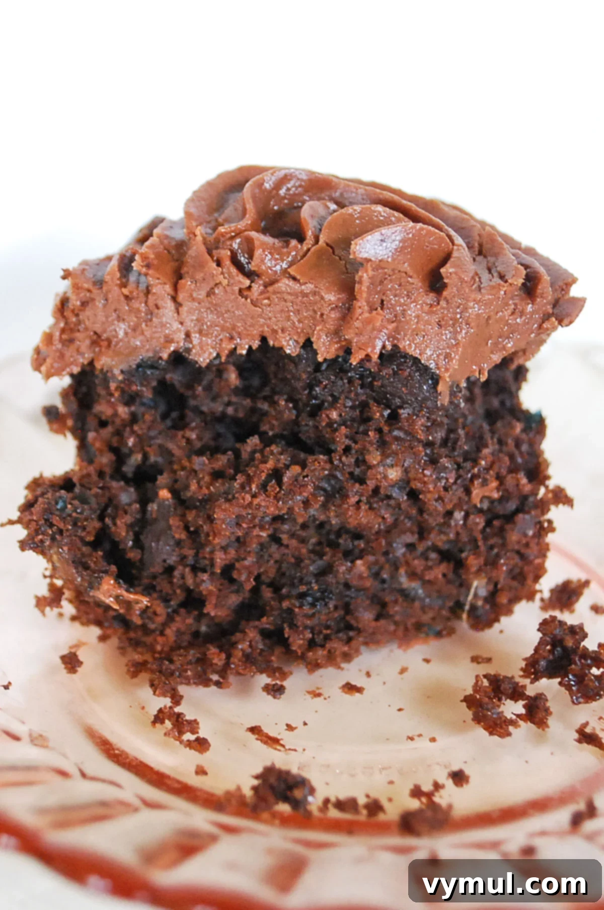Secretly Healthy Chocolate Zucchini Cupcakes 7 Close-up of a moist interior of a chocolate zucchini cupcake, revealing its tender crumb