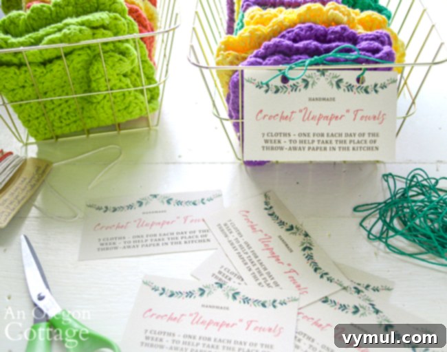 Close-up of a handmade label being attached to a crochet unpaper towel gift basket with twine.