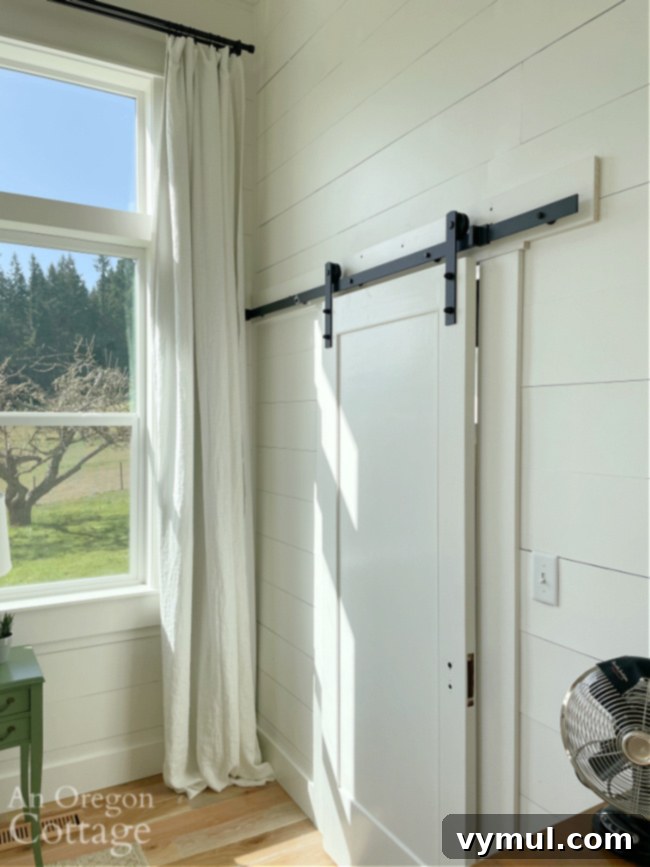 Farmhouse Moving Day: Vintage Finds, Cozy Linens, and Literary Treasures 8 linen curtain panel-closet barn door in master bedroom