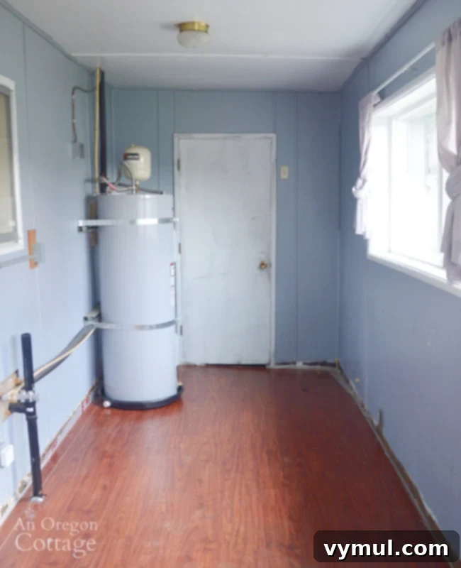 Farmhouse enclosed porch before-left side with washer
