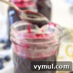 blueberry syrup on spoon