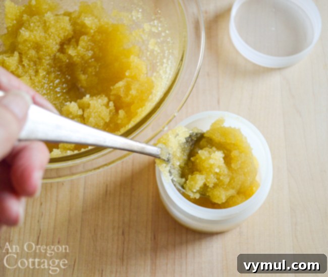 adding sugar scrub to container