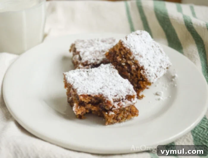 Flourless Chewy Noels Bars A Fresh Take on Christmas Cookie Classics 3 Christmas Noel cookies arranged on a festive plate.