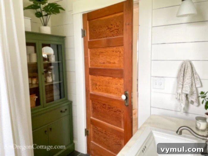 1900 Farmhouse Main Bathroom: Classic Charm Reimagined 17 farmhouse main bath-door-cabinet after