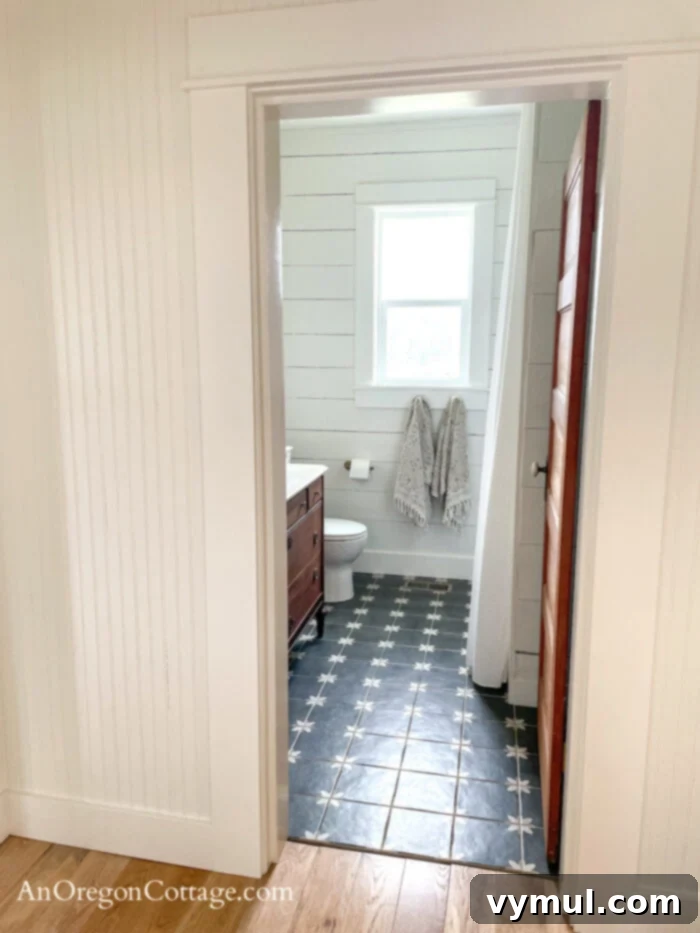 1900 Farmhouse Main Bathroom: Classic Charm Reimagined 10 farmhouse main bath from hall AFTER