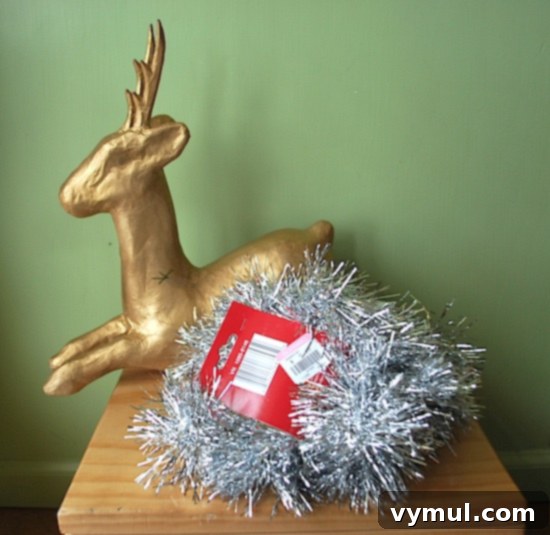 thrift-store-christmas-finds Assortment of thrift store Christmas finds, including tinsel garland