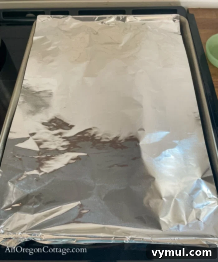 Thick Smoky Roasted Chipotle Salsa 5 steaming roasted peppers with foil