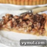 Easy Honey Caramel Triple Nut Tart 10 triple nut tart piece close