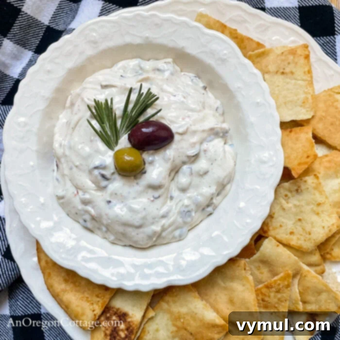 Velvety Roasted Olive Spread 6 roasted olive dip above in white bowl