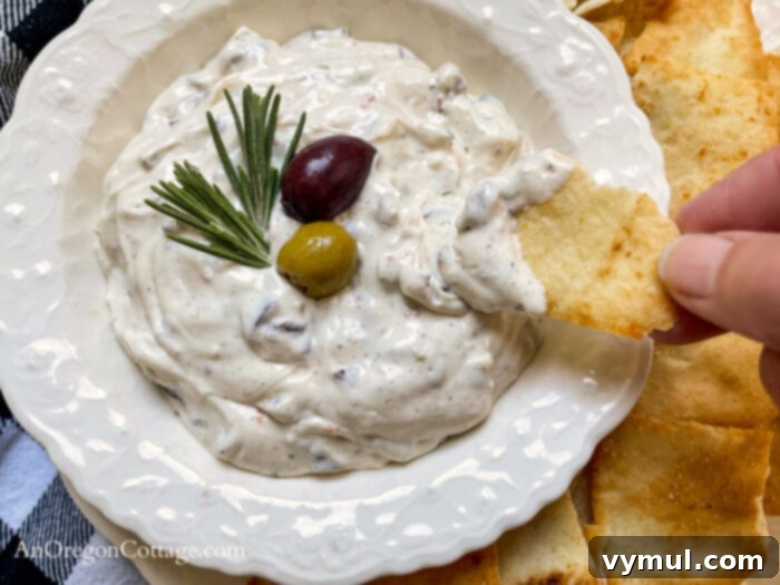 Velvety Roasted Olive Spread 7 roasted olive dip on pita above