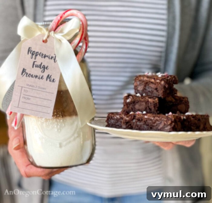 My 2022 Top Picks: Favorite Recipes, DIYs, and All-Time Hits 3 Peppermint fudge brownie mix displayed in a jar next to baked brownies on a plate.