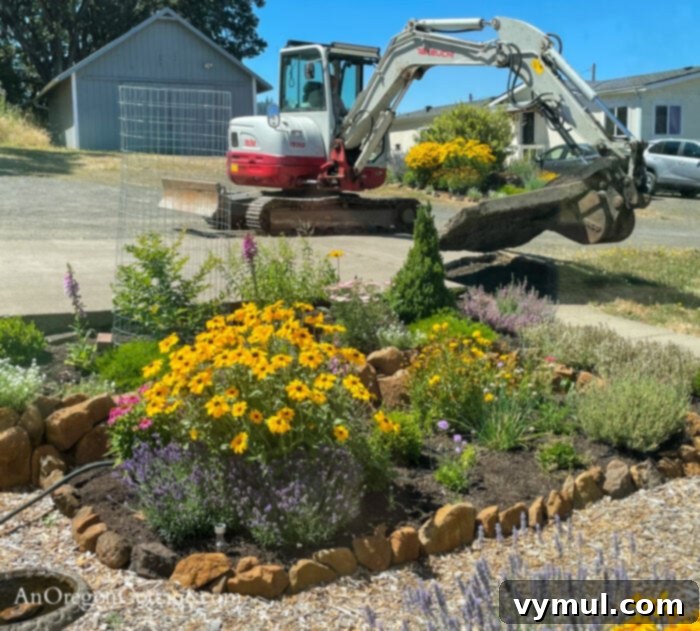 Recap, Reframe, Realign: Your 2023 Vision 6 Excavator removing farmhouse cement pad, marking the start of a major outdoor renovation and heavy machinery use