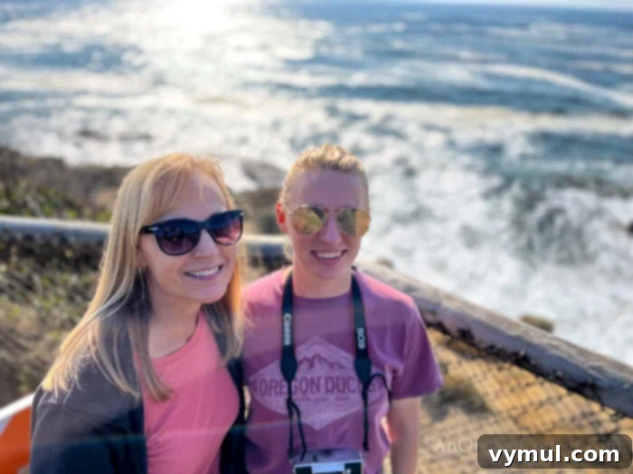 Recap, Reframe, Realign: Your 2023 Vision 7 Mother and daughter at cliff at Otter Rock, enjoying a coastal trip and scenic views