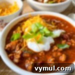 chili in bowl with toppings