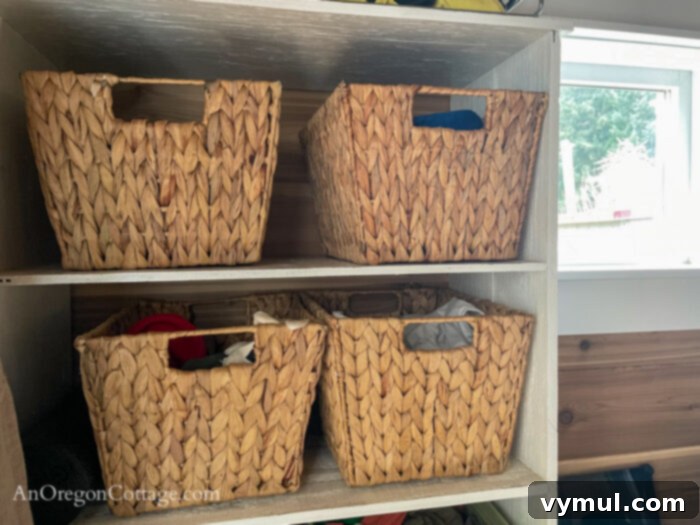 Good Things 58: Cultivating Calm, Organizing Chaos, and Curating Reads 6 Four uniform 12-inch hyacinth baskets on a closet shelf for clothes storage