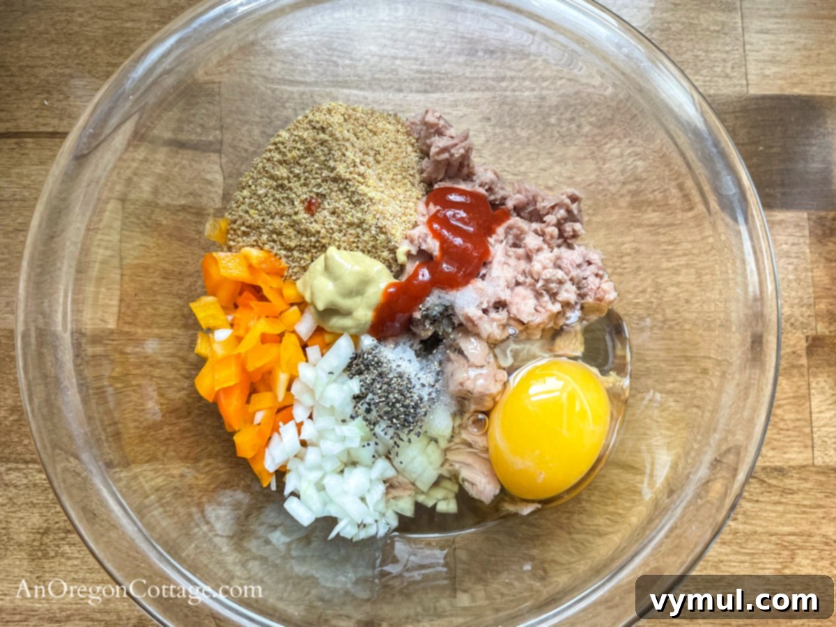 Effortless 15 Minute Tuna Patties Healthy Breadcrumb Free Keto Paleo Gluten Free 5 tuna patty ingredients in bowl