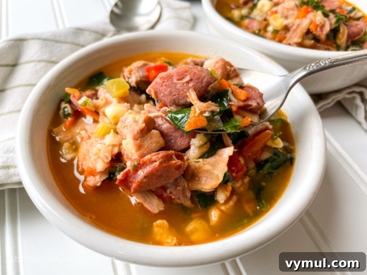 Quick Cajun Chicken Barley Harvest Soup 4 Cajun Chicken Barley Vegetable Soup on spoon in bowl